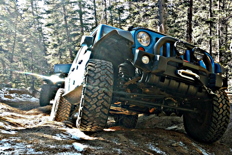 Blue Jeep on the trail