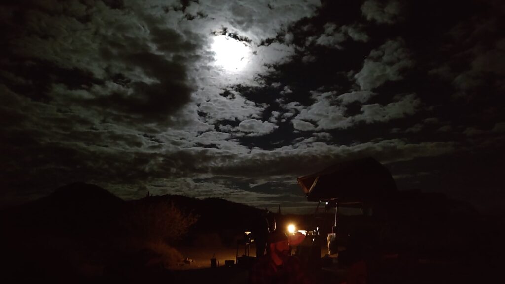 Camping under the desert night sky.
