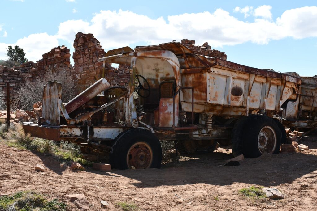 Old haul trucks at the Grand Gulch mine
